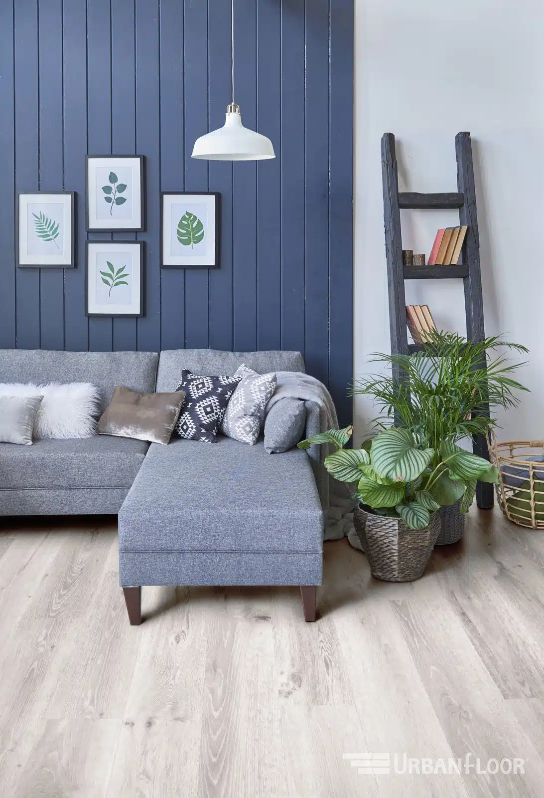 Engineered hardwood installer preparing real wood plank layout for an Austin TX interior
